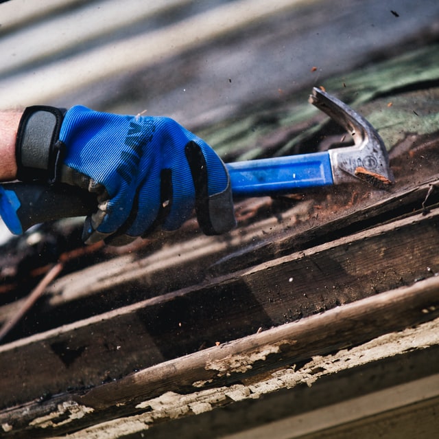 Repairing roof damage in Rockwall, Texas when there is a leak. Hail damage is a big problem in Texas that causes many roof to fail.
